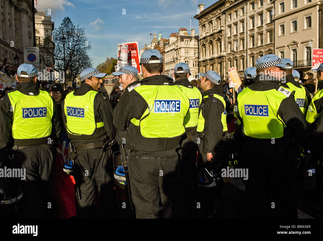 A line of Metropolitan Police Officers kettling at a demonstration in