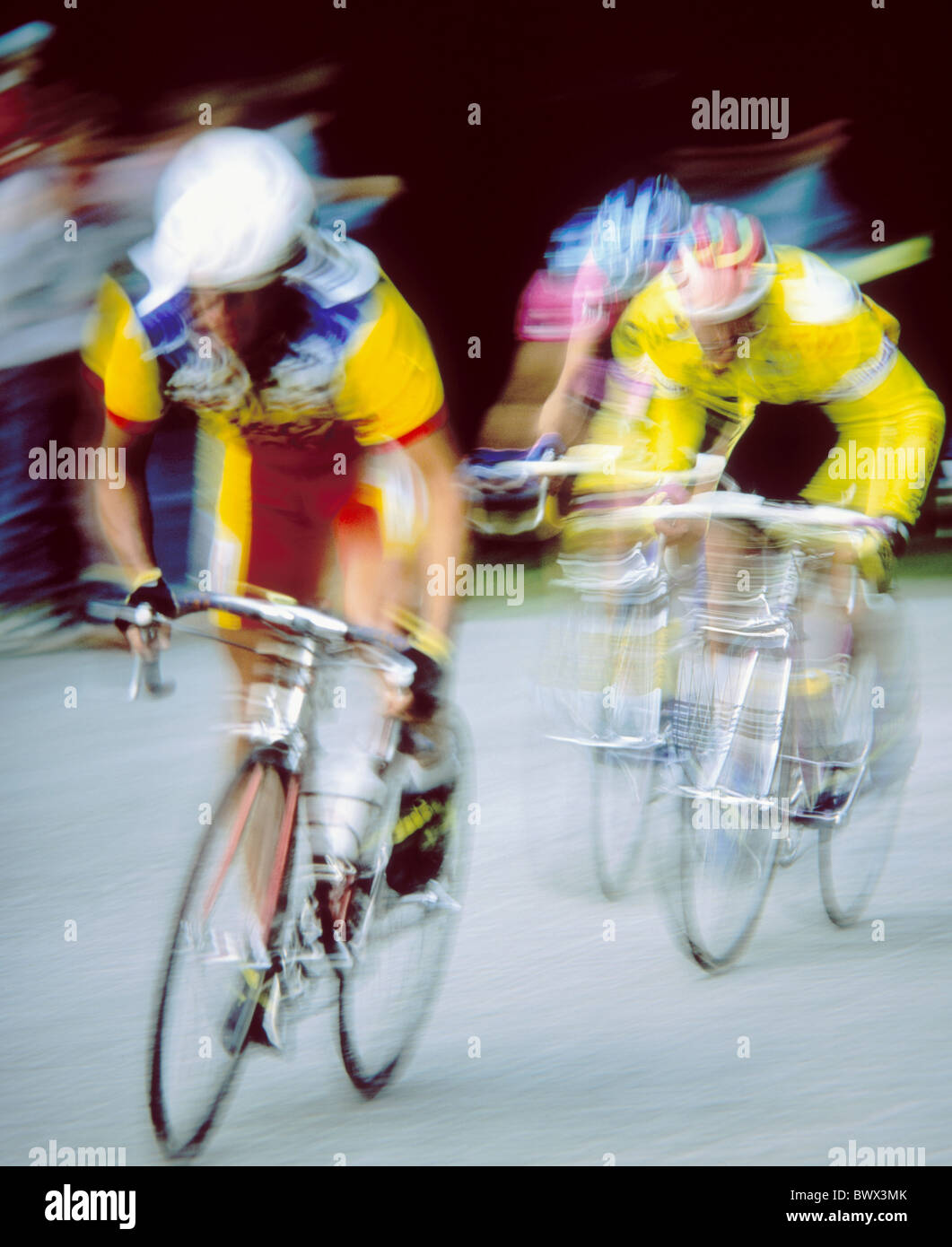 group helmets racing bicycles sport street running blurs runnings Stock Photo
