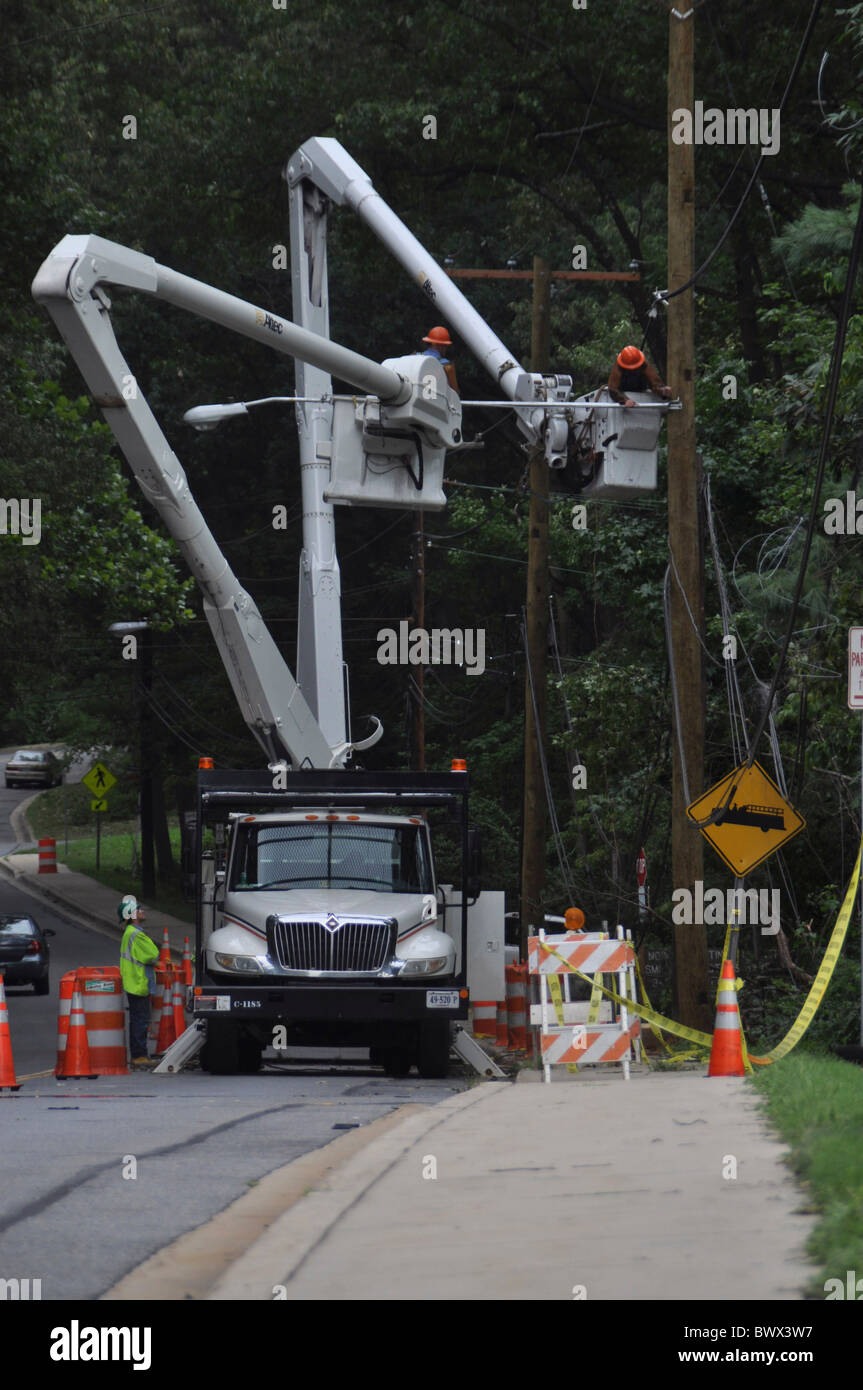 Utility workers working on electrical lines in Greenbelt, Maryland USA