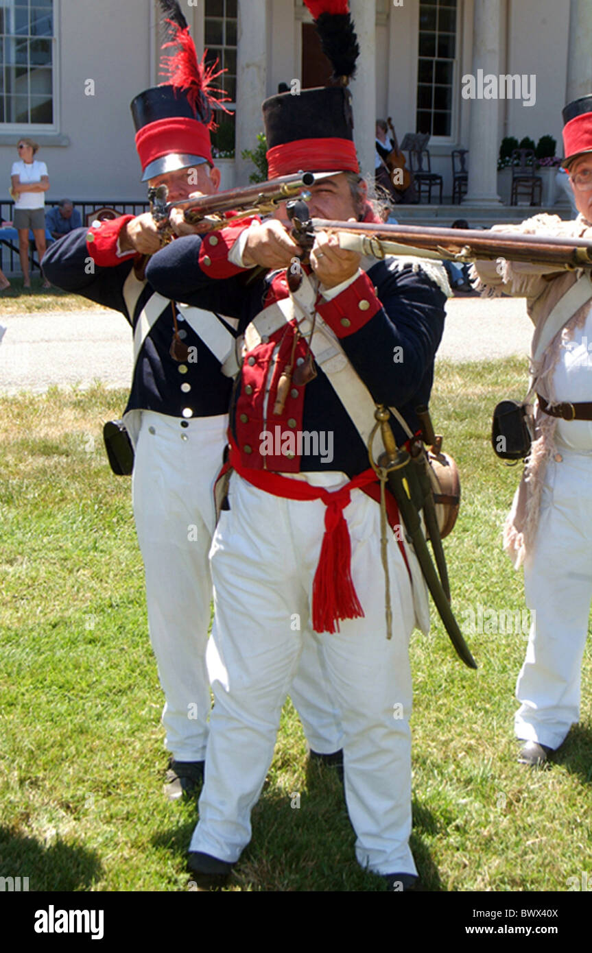 men dressed as American troops aim their guns during reenactment of War of 1812 at the Riversdale Mansion in Riverdale Park,Md Stock Photo