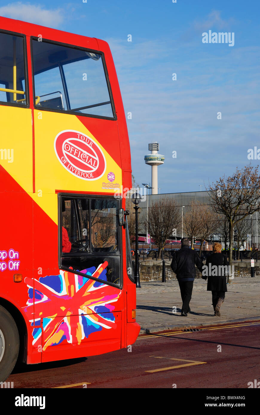 Red tourist bus with Union Jack in Albert Dock, Liverpool. Stock Photo
