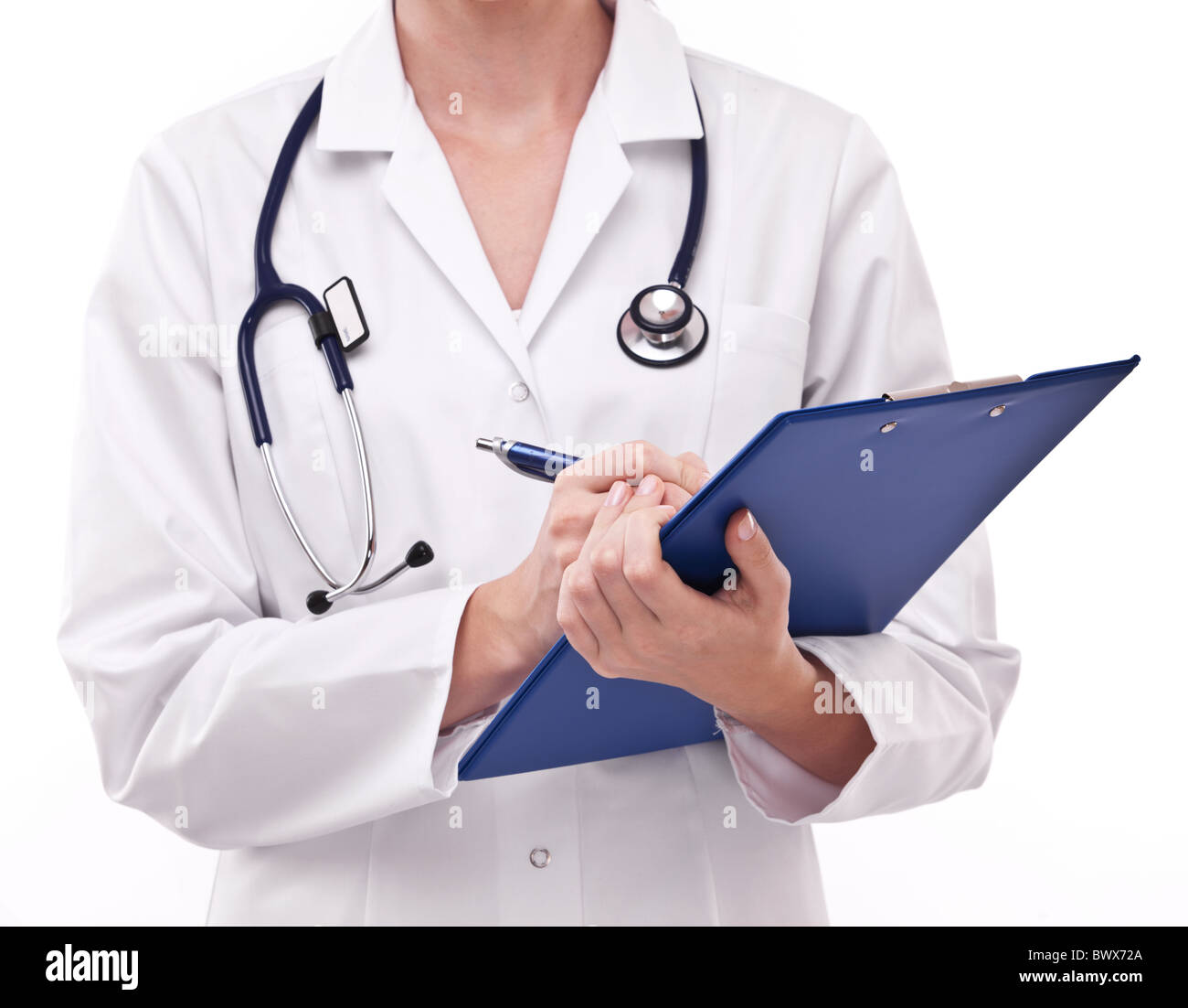 Doctor completing on medical card. Isolated on a white. Stock Photo