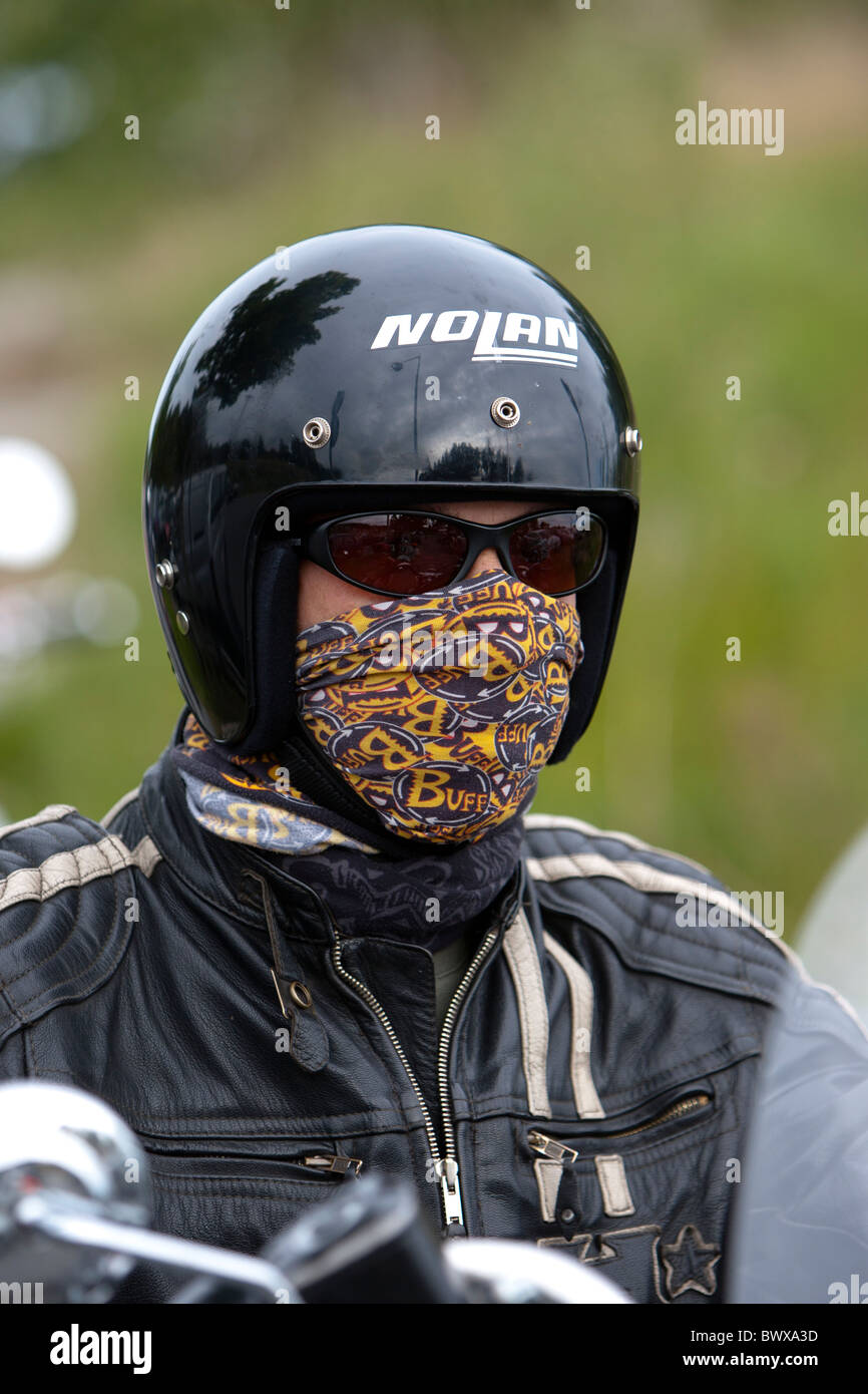 Motorcyclist With The Protection Of His Mouth Stock Photo Alamy