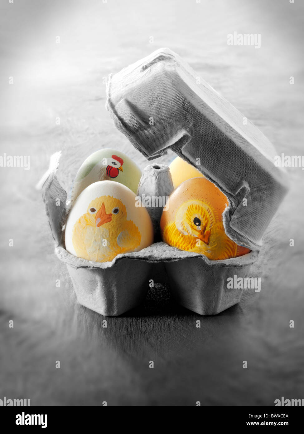 Hand painted chicken eggs with traditional Easter chicks design Stock Photo