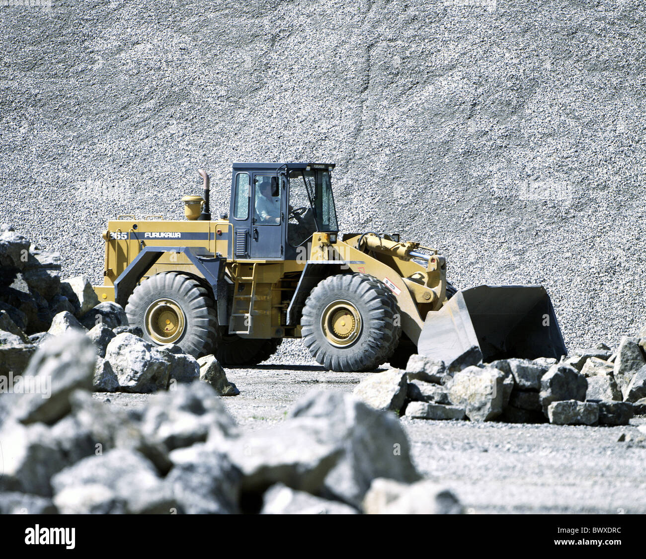 industry cutting part excavator mining heap gravel pit gravel grit road metal Stock Photo