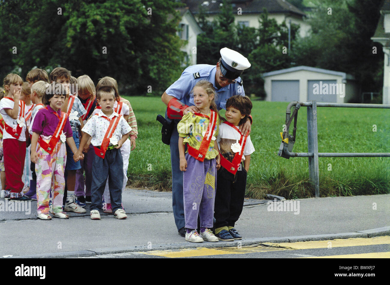 Switzerland Europe kindergarten police children lessons school street  school way crosswalk pedestrian's st Stock Photo - Alamy