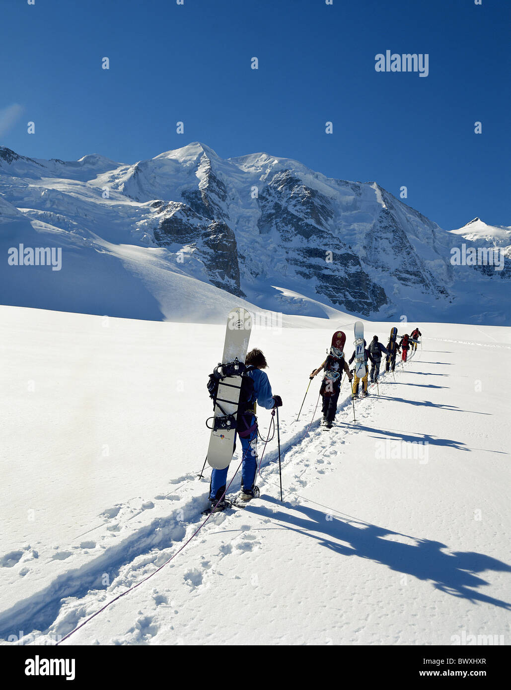 winter sports sport Bernina area behind Piz Palu canton carry wear Graubunden Grisons Switzerland Europe Stock Photo