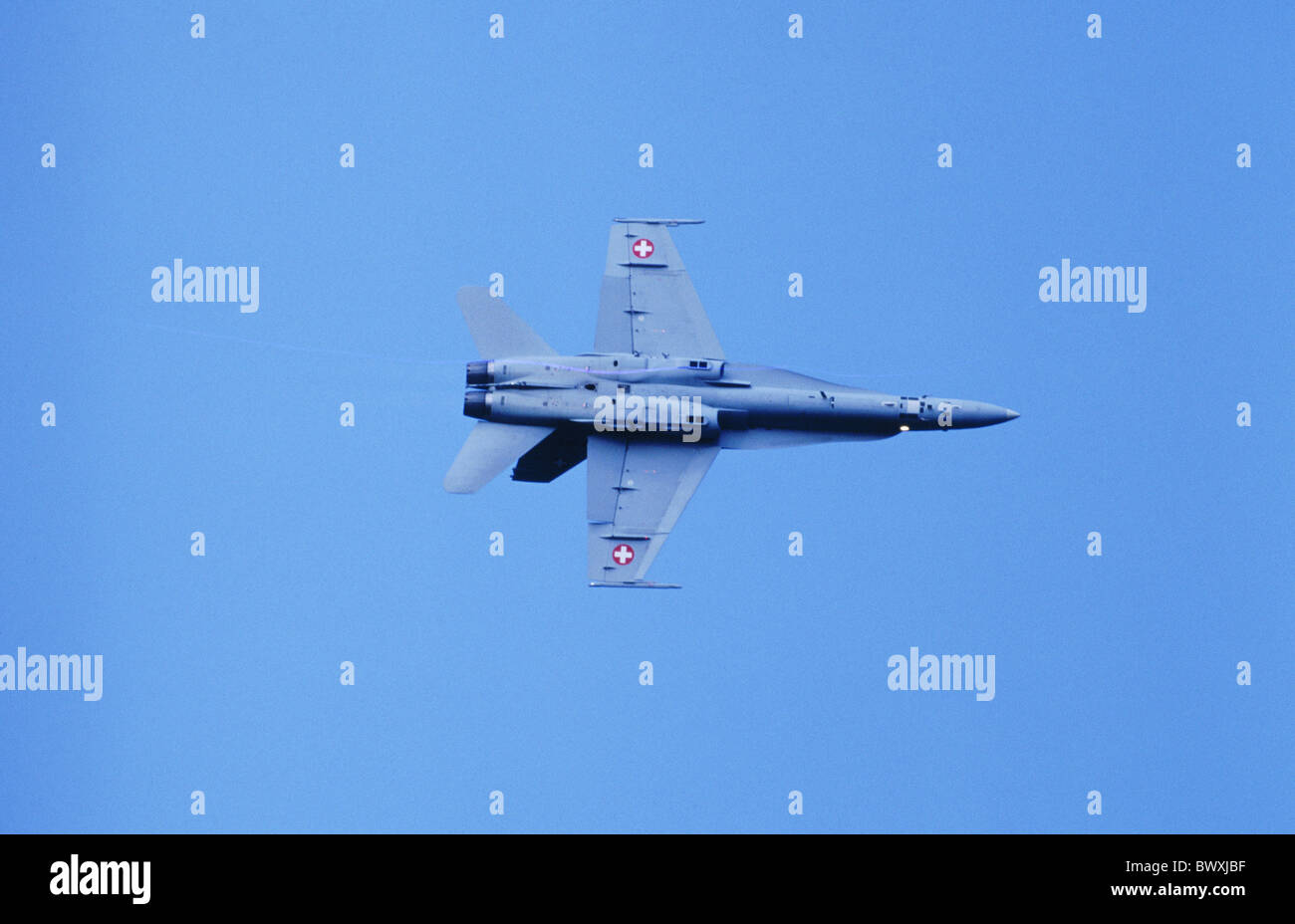 FA 18 Hornet McDonnell Douglas from below in flight air force military Switzerland Europe airplane fly fi Stock Photo
