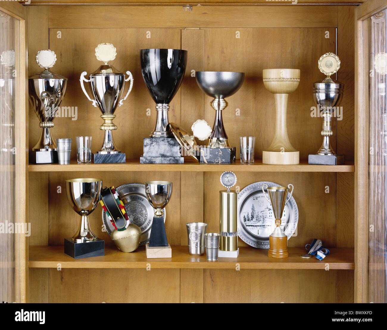 bell cups showcases sport plate trophies associations victory Stock Photo