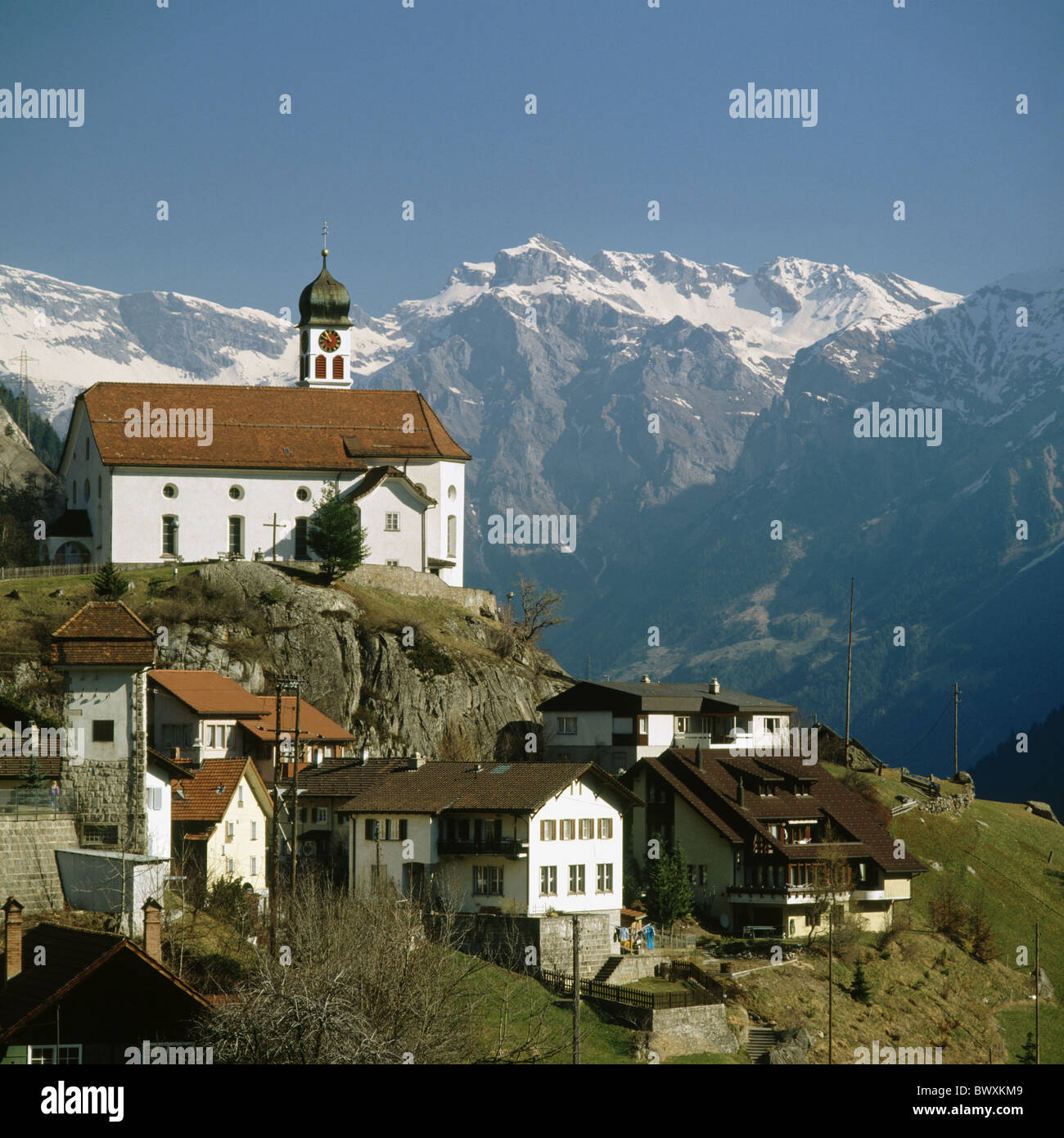 mountains hills chapels Switzerland Europe Uri Wassen residential buildings Stock Photo