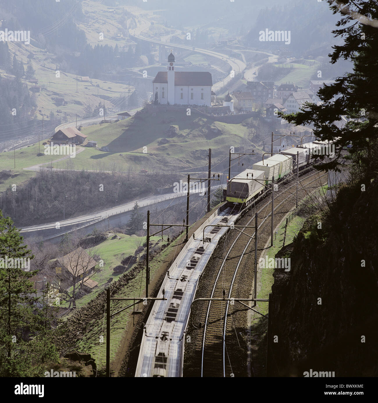 railway Switzerland Europe SBB canton Uri near Wassen Pickaback transport rails truck cargo transit Stock Photo