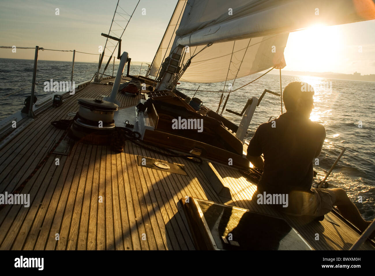 man sailing on the Atlantic ocean on a america's cup racing sail boat Stock Photo