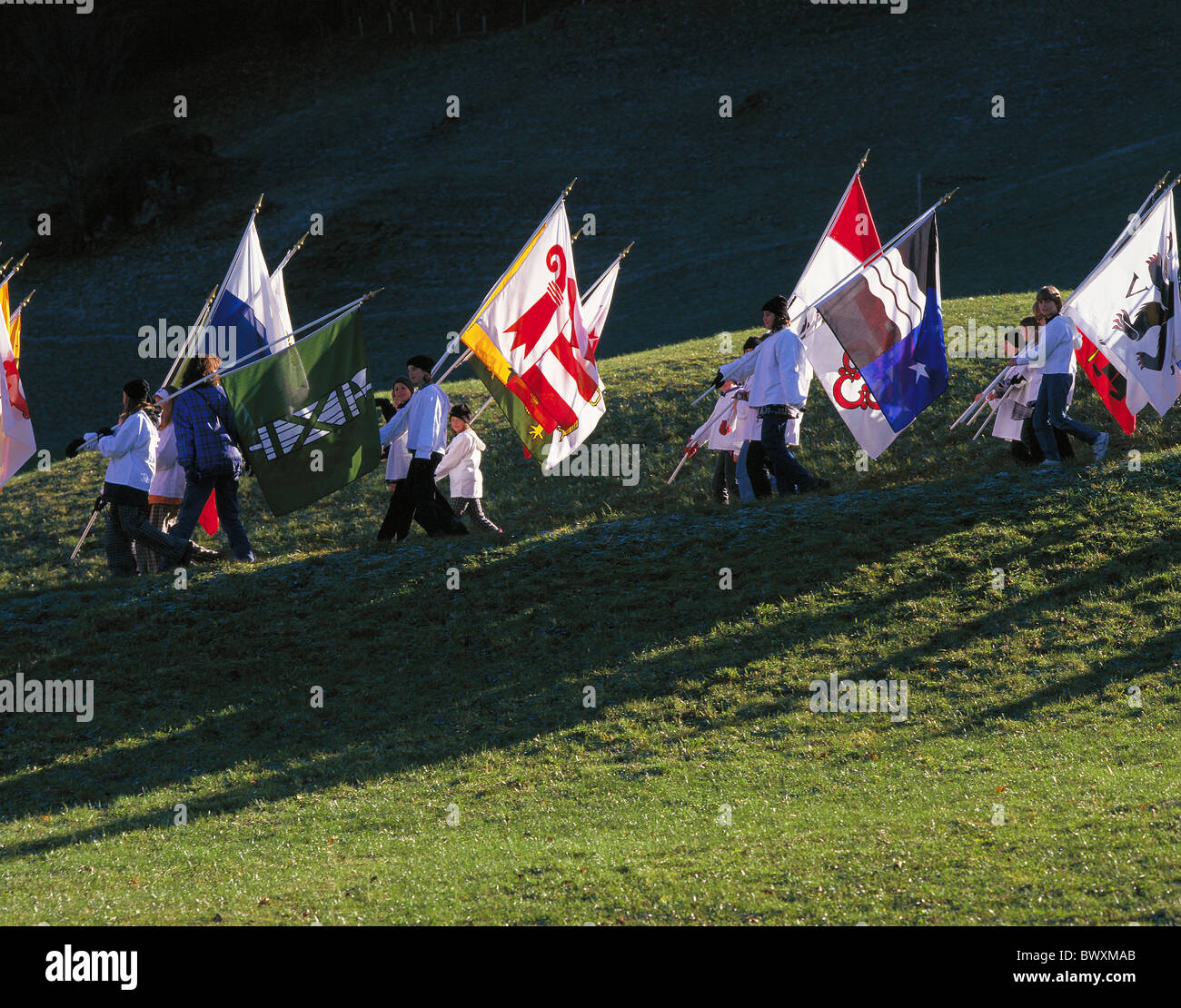 dusk twilight standard-bearer ensign commemorative celebration anniversary youngsters cantons battle fight Stock Photo
