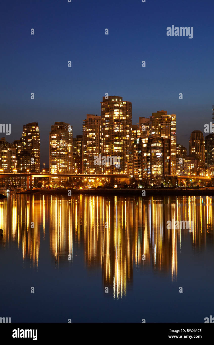 CBD reflected in False Creek, Vancouver, British Columbia, Canada Stock Photo