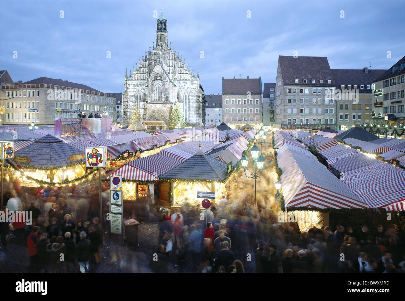 Christmas fair Germany Europe church people at night Nuremberg overview