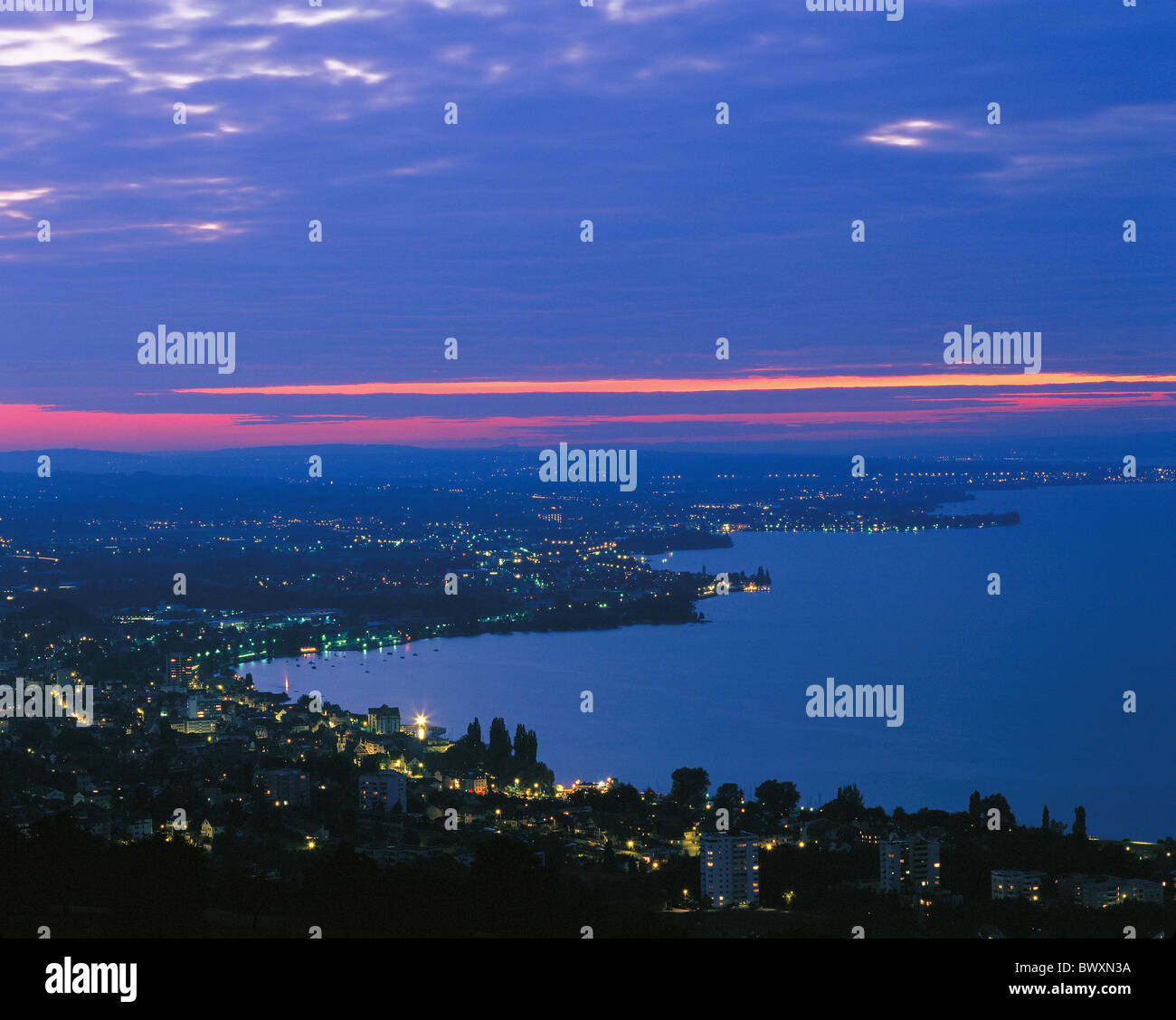 cloudiness lake Constance lake sea lights at night Rorschach Switzerland Europe St. Gallen overview Stock Photo