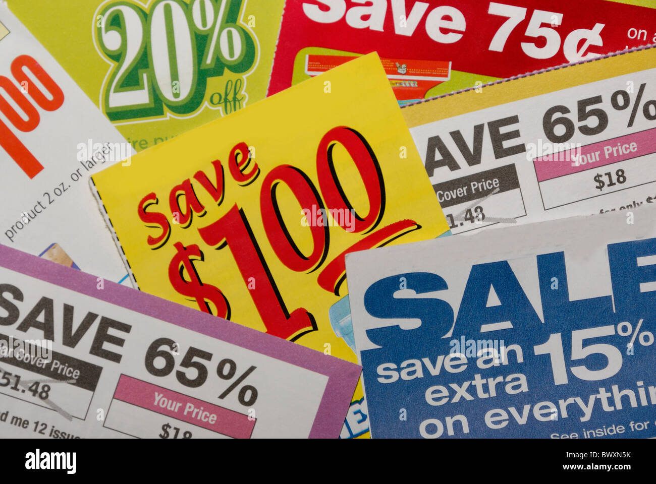 Close up of several colorful store coupons and discounts Stock Photo - Alamy