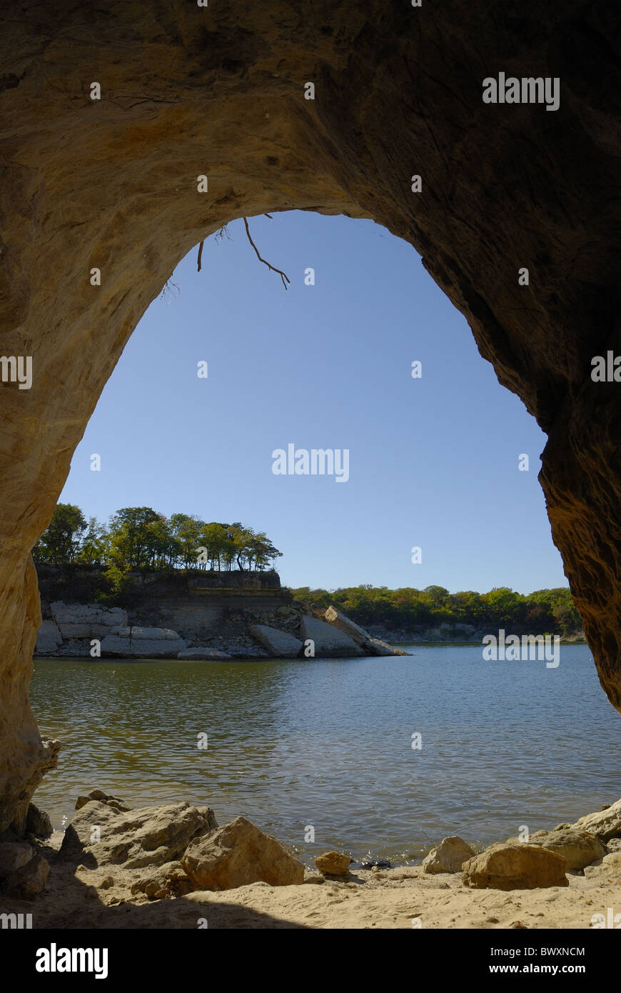 Opening of a cave from the inside showing Lake Texoma from the opening