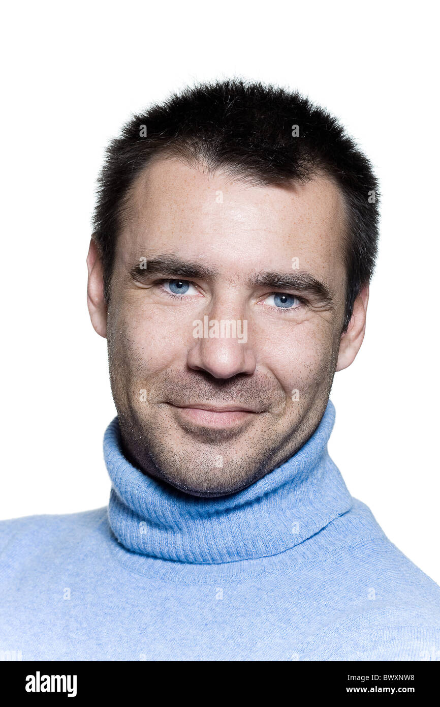 studio portrait on isolated background of a stubble man smiling Stock Photo