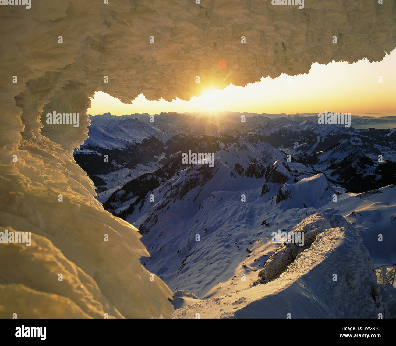 evening mood Appenzell ice grotto panorama Santis Schwagalp Switzerland Europe winter Stock Photo