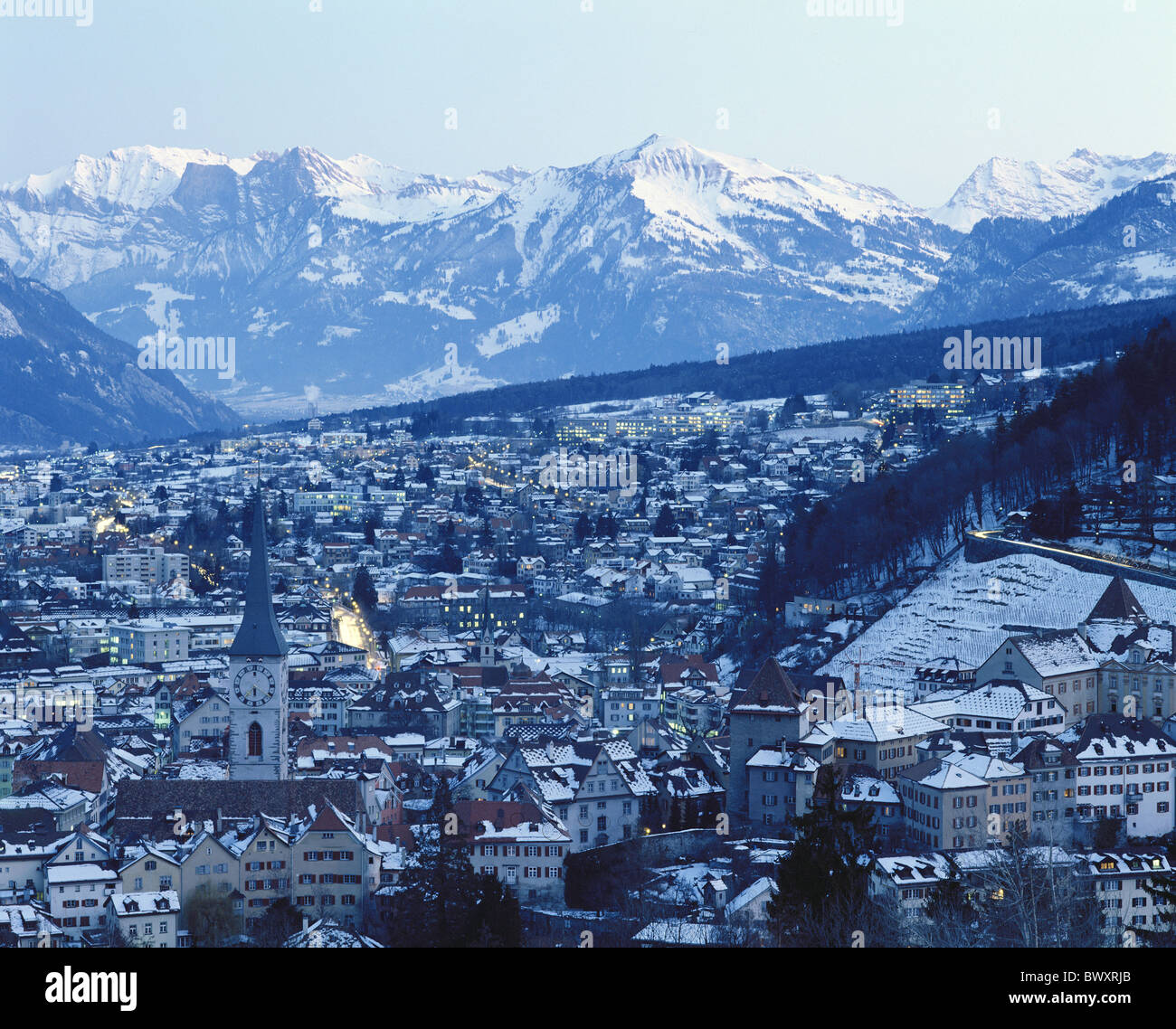 evening dusk twilight town city of Chur Rhine Valley Graubunden Grisons Switzerland Europe overview wint Stock Photo