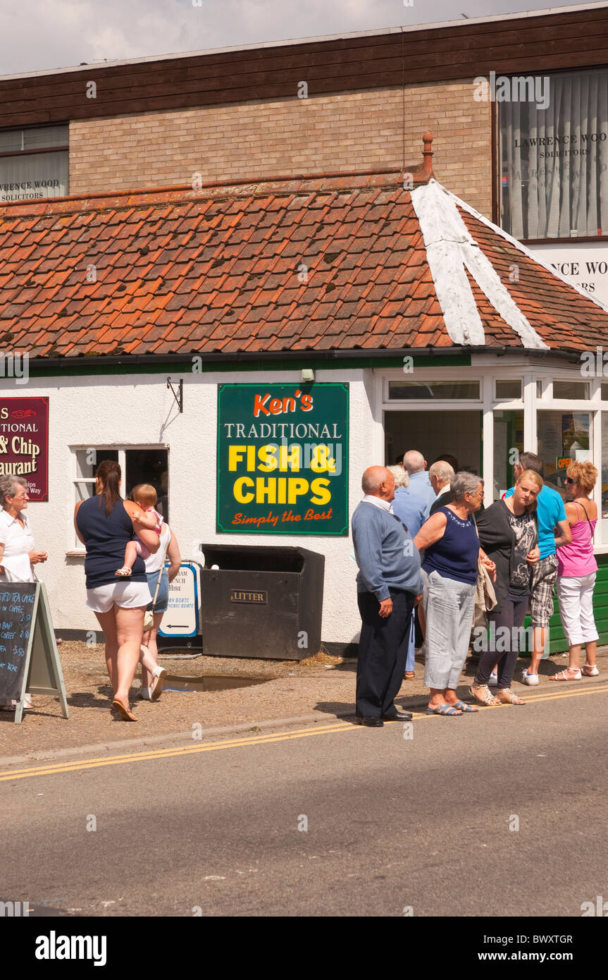 People outside Kens traditional fish and chips chip shop restaurant in