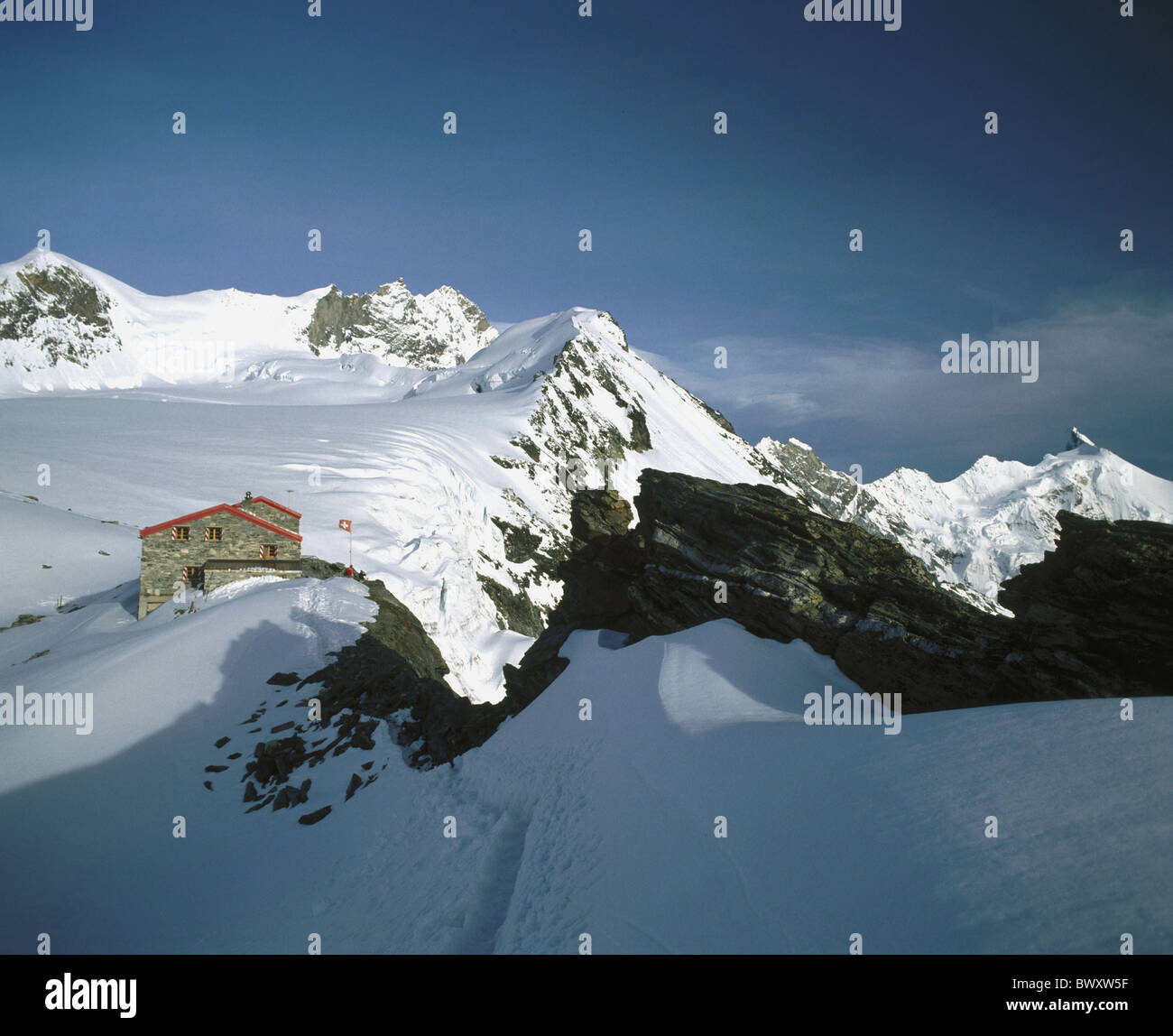 evening mountain hut Cabane de Tracuit scenery matt valley Switzerland Europe Valais Weisshorn Stock Photo
