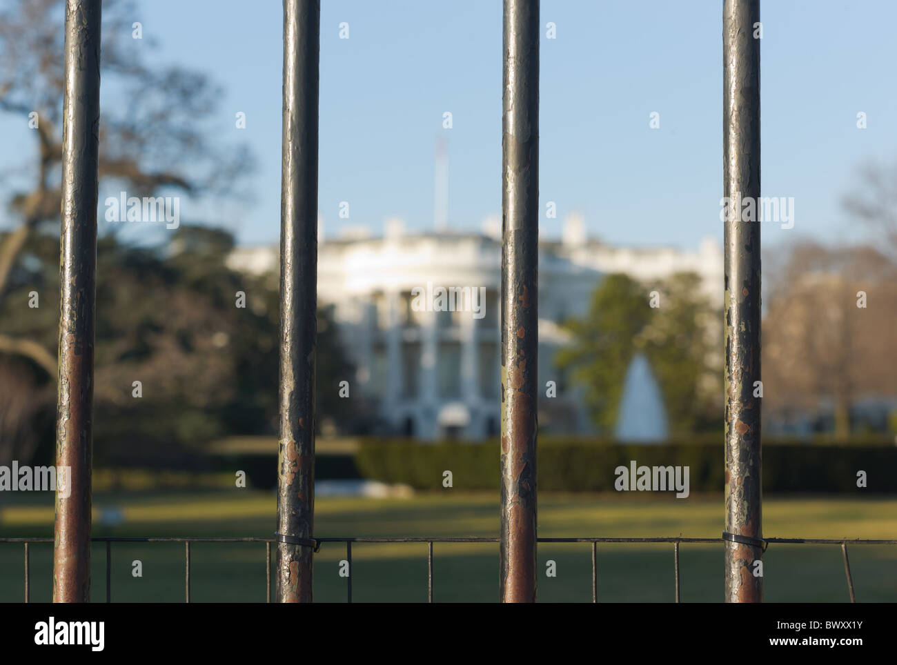 The White House, viewed through security bars, in Washington, DC. Stock Photo