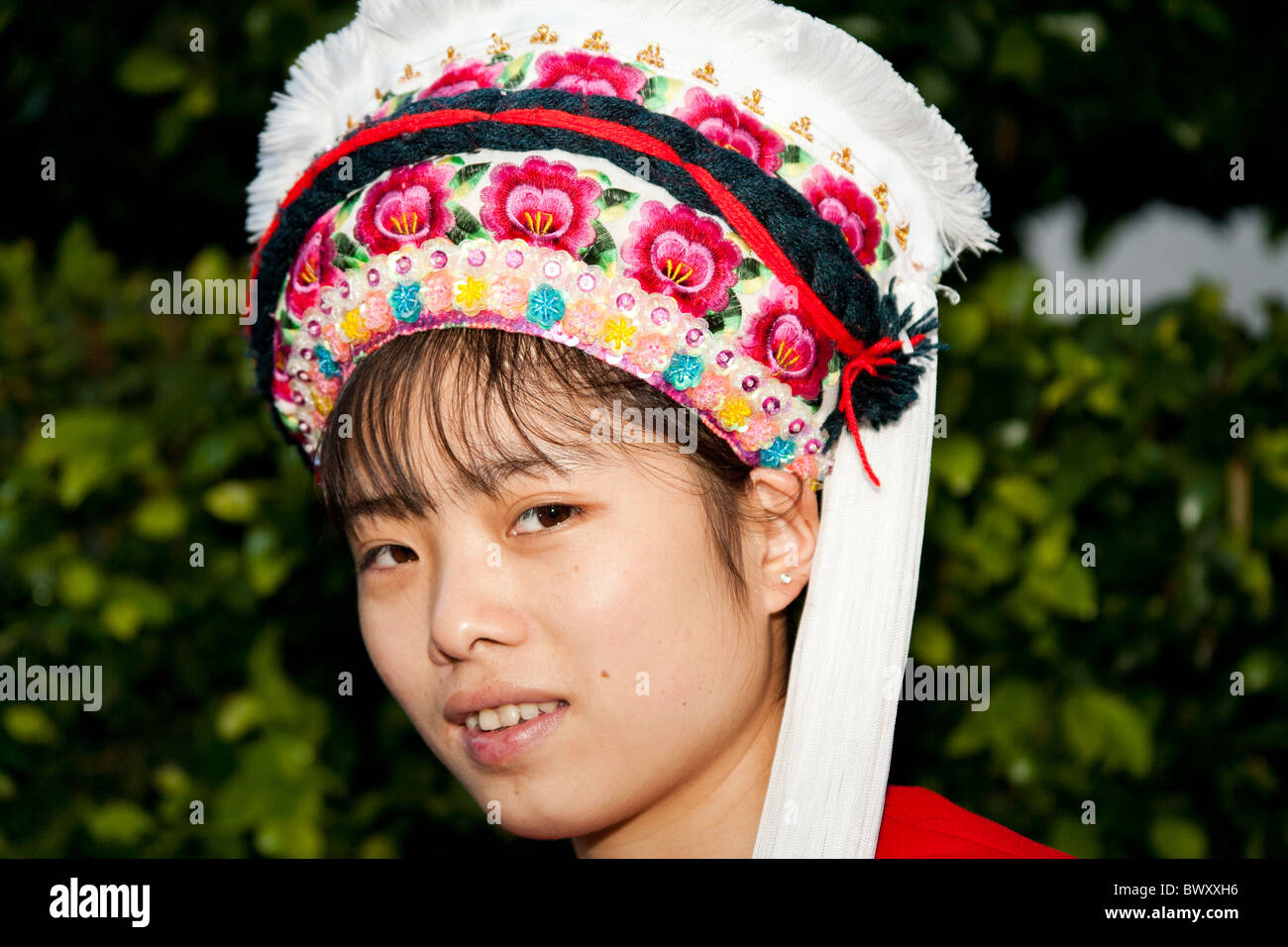 Bai woman wearing colourful traditional Bai headdress, Dali, Yunnan ...