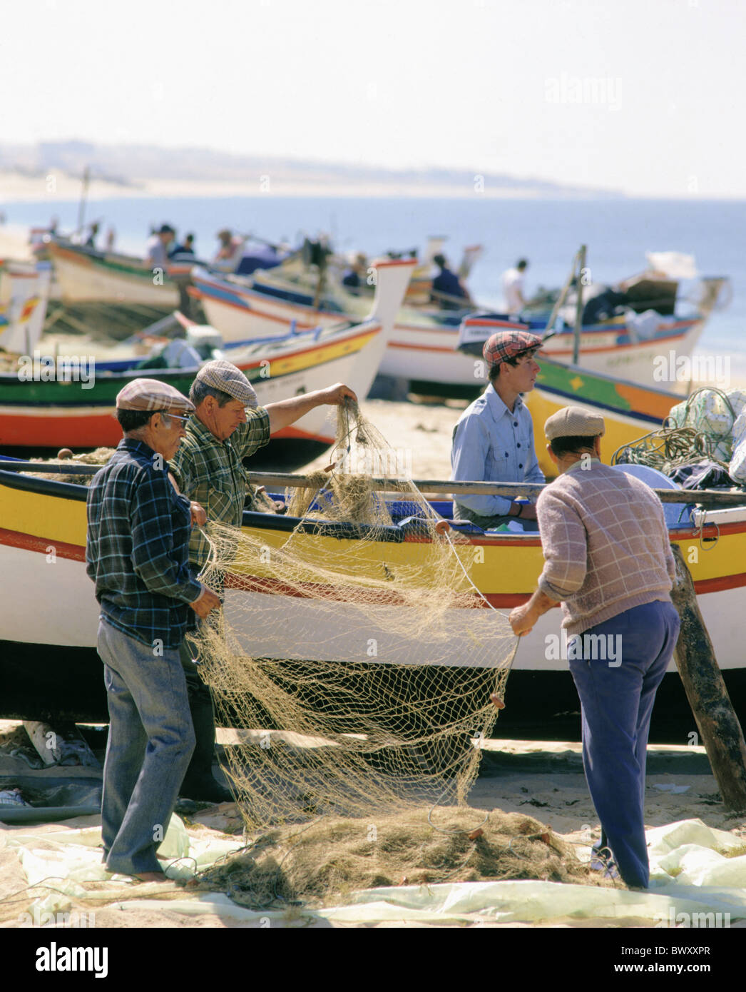 Algarve Fischer fishing boats fishing fishery nets Portugal traditional Stock Photo