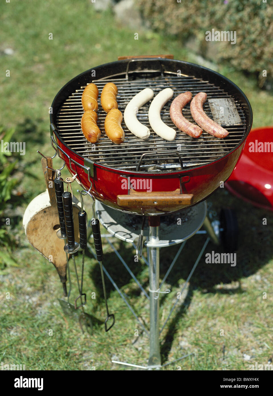 cutlery silverware bellows grill barbecue sausages Food food eating cooking boiling barbecue Stock Photo