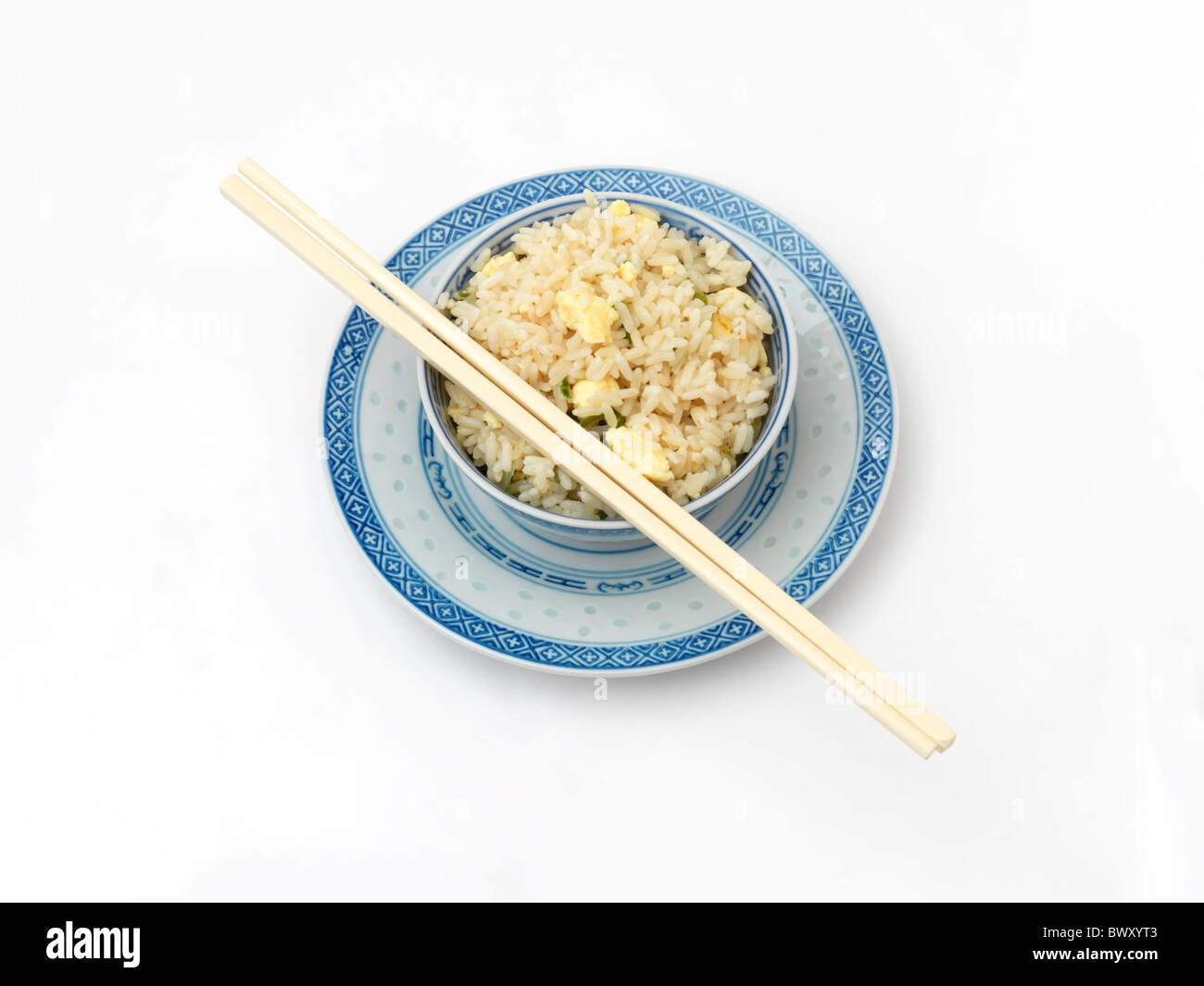 Bowl of Egg Fried Rice with Chop Sticks Stock Photo