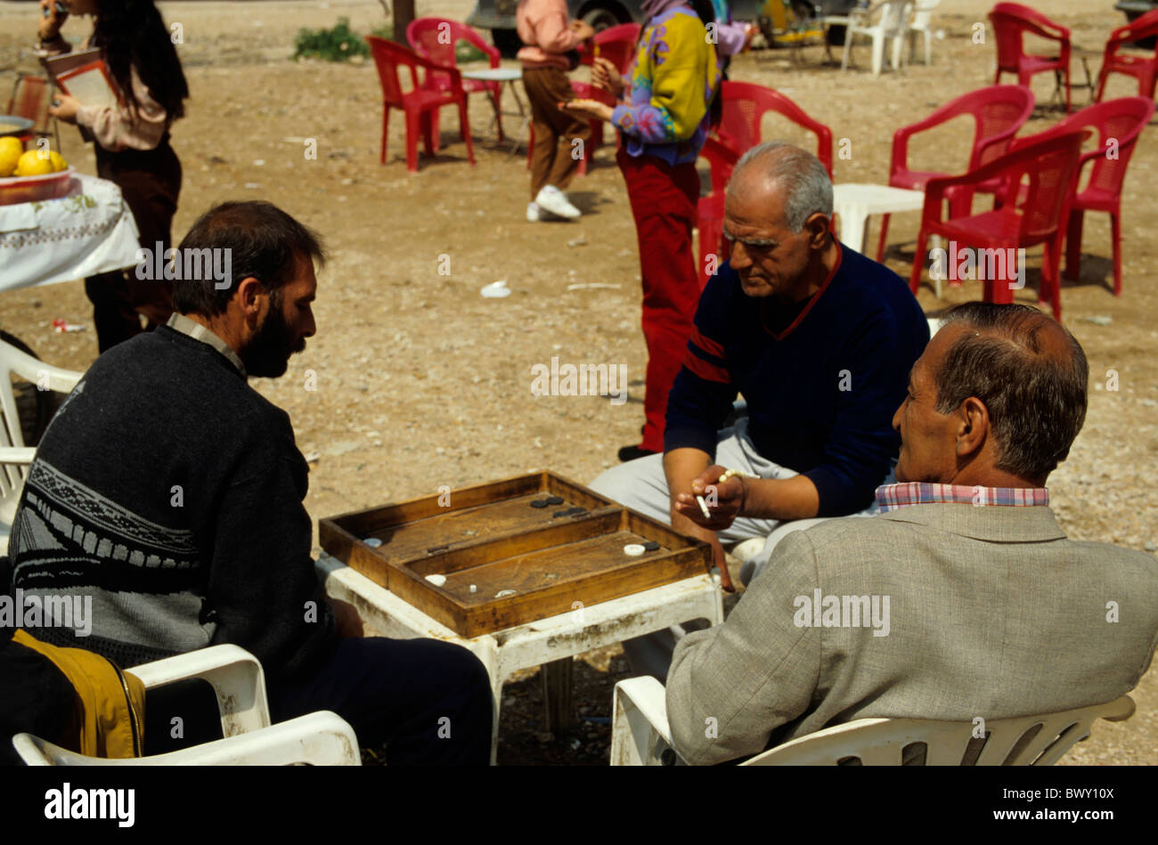 Men playing a board game in Martyr's Place, Beirut, Lebanon. Stock Photo