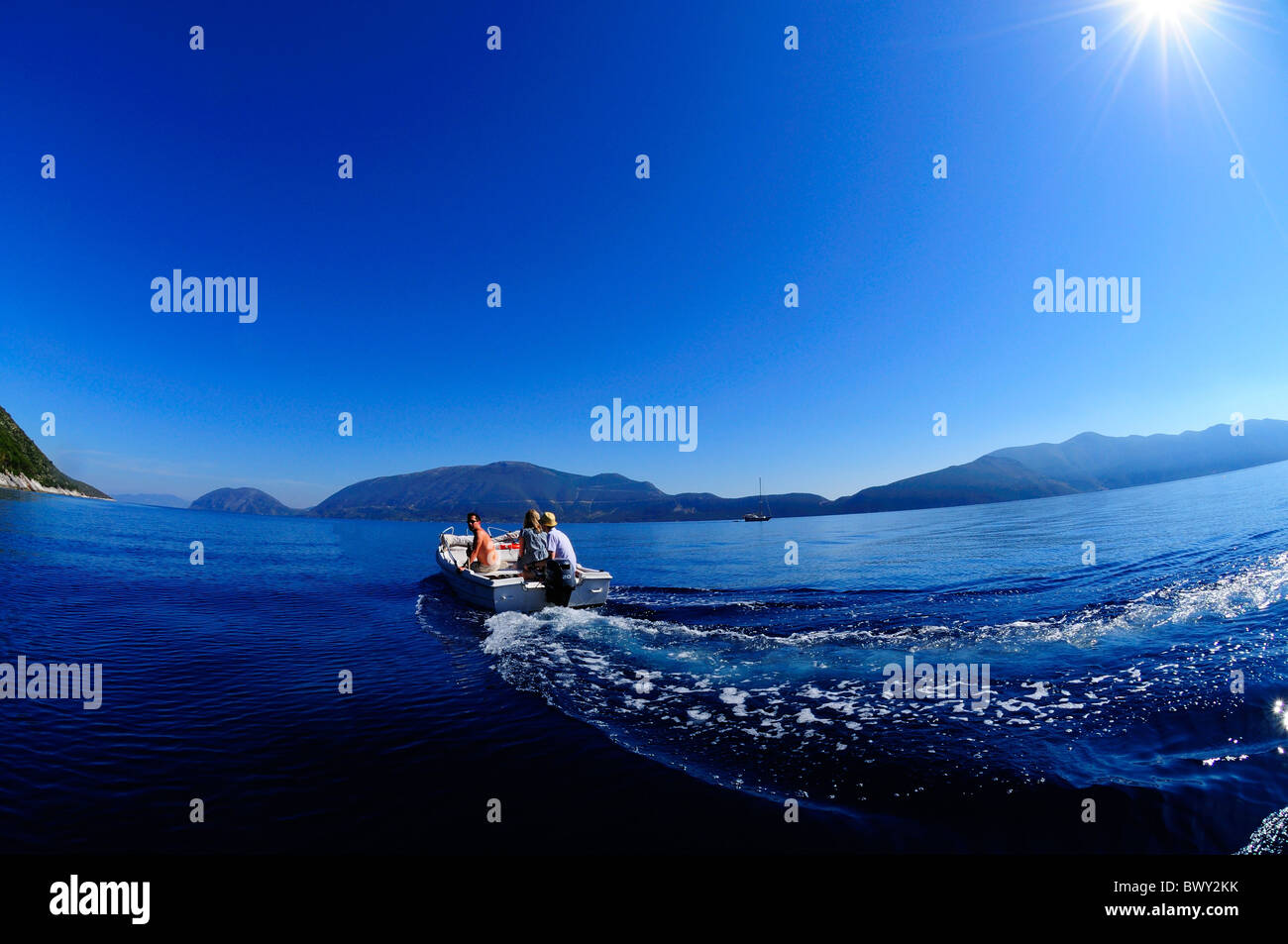 Outboard Motor Boat off the coast of Kefalonia Greece Stock Photo