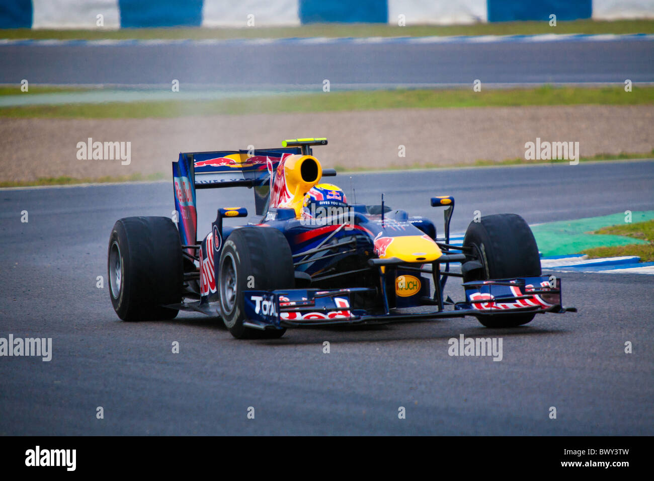 Formula 1 Jerez Mark Webber Pit lane Red Bull Test auto automobile blur blurred car championship chassis circuit competition Stock Photo