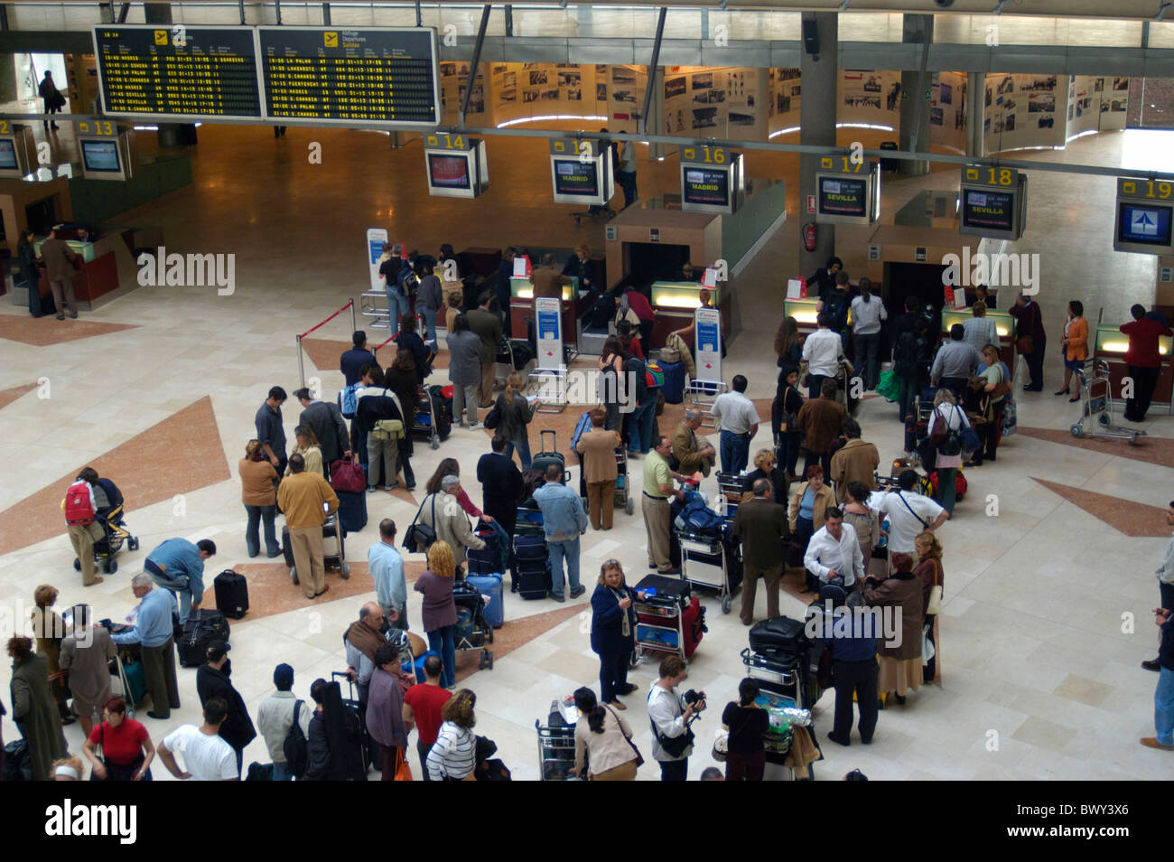 airport aviation check in holidays human queue inside overview passengers queue Spain Europe airport aviation check in holidays human queue inside overview passengers queue Spain Europe