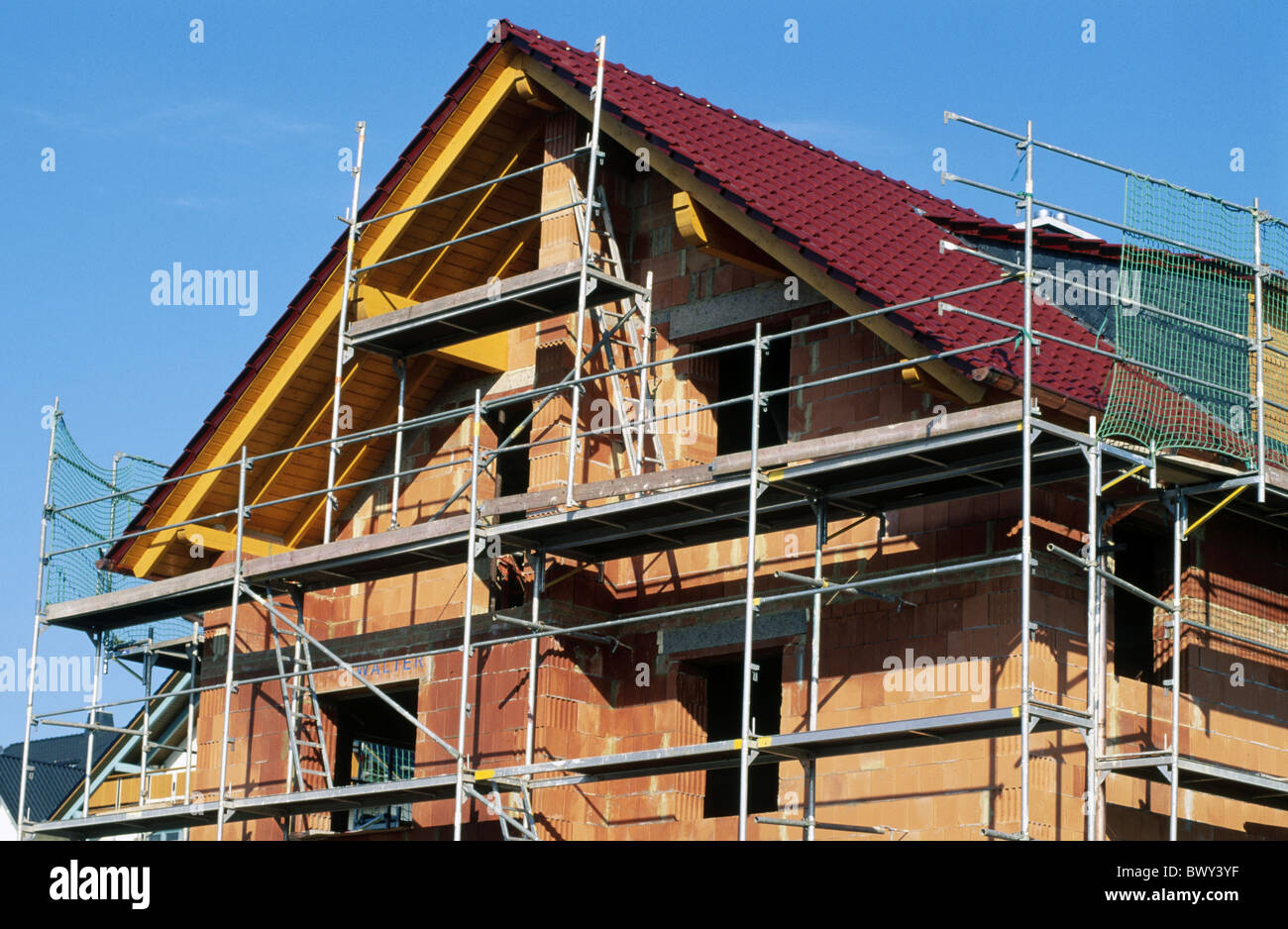 construction scaffold one family home dwelling house house construction house home construction building si Stock Photo