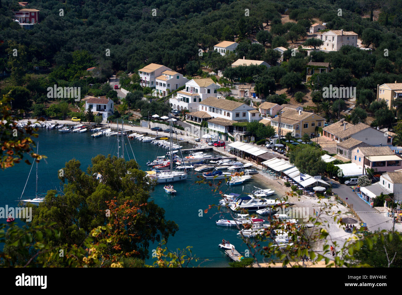 The harbour of Agios Stefanos AKA San Stefanos in North Eastern Corfu Stock Photo