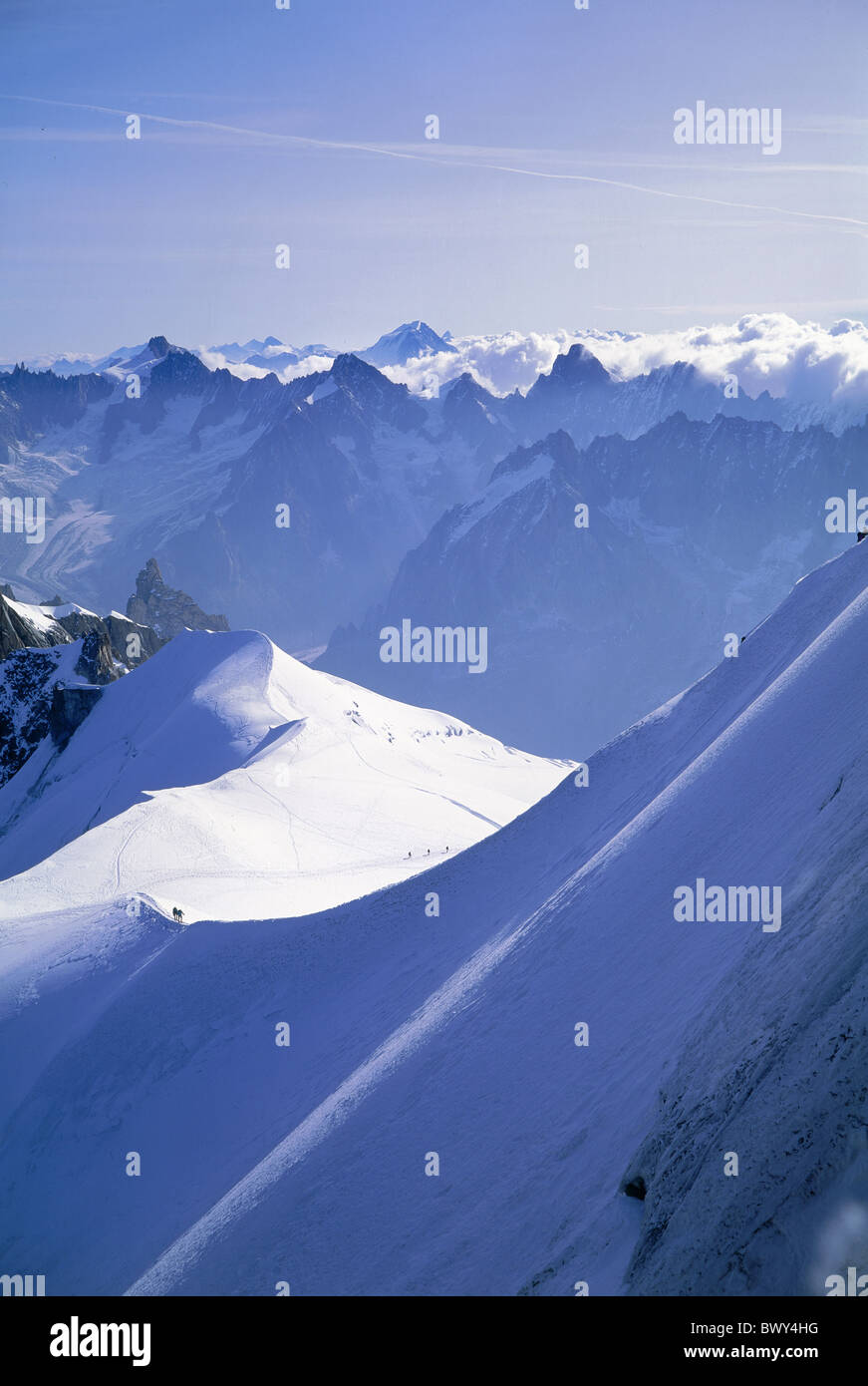 mountaineering sport snow ropes remote panorama France Europe Col du Plan Dent du Requin Montblanc massif Stock Photo