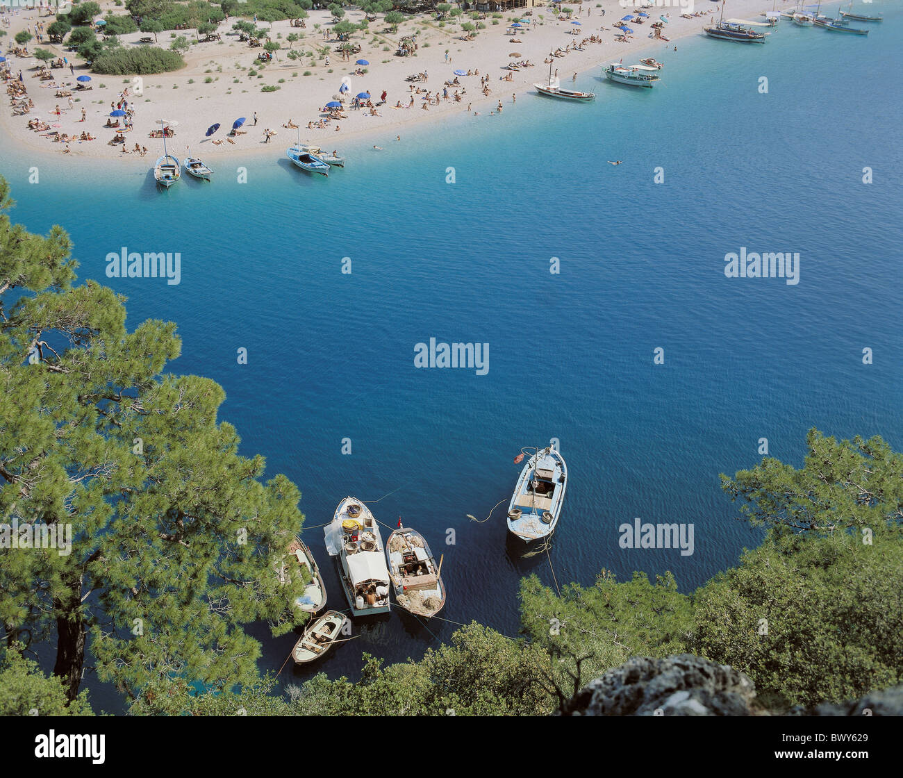 Turkey Fethiye Oelu Deniz overview lagoon beach seashore person bathing holidays vacation coast sea Medit Stock Photo