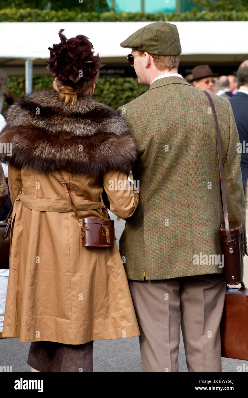 A couple in period costume attending the 2010 Goodwood Revival meeting, Sussex, England, UK. Stock Photo