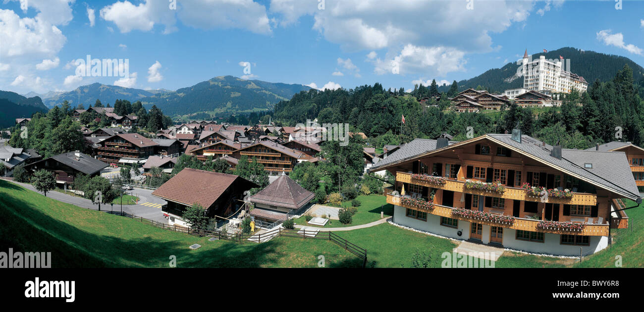 Berne Canton Bern chalet Gstaad homes hotel houses mountains overview panorama Saanenland Switzerland Eu Stock Photo