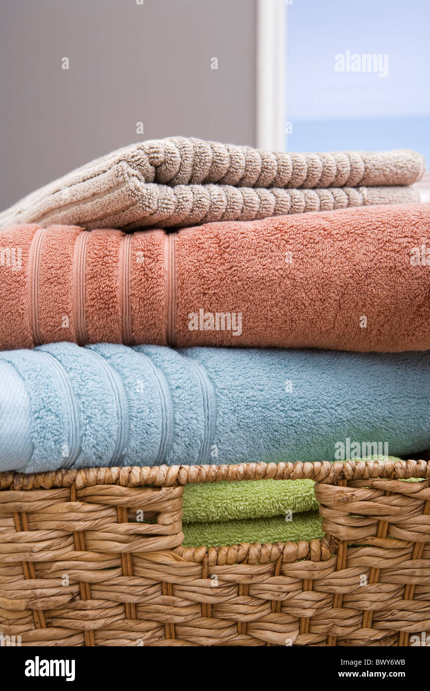 Basket with Folded Towels Stock Photo Alamy