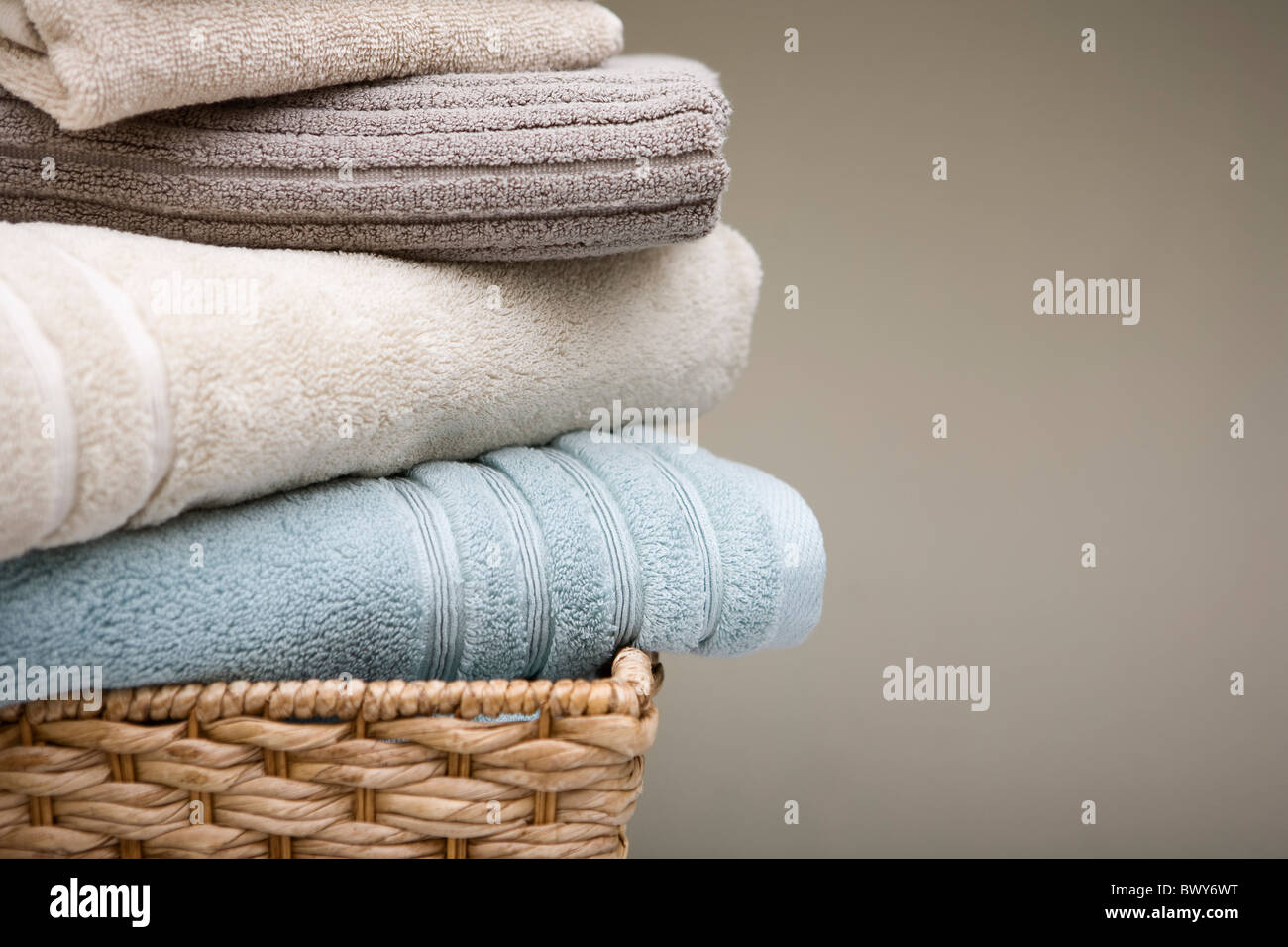 Basket with Folded Towels Stock Photo Alamy