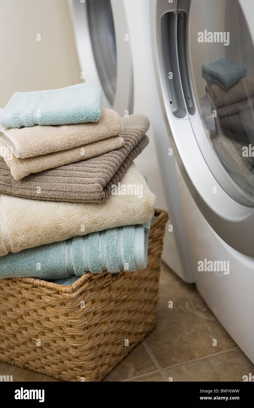 Stack of Clean Towels Beside Washer and Dryer Stock Photo Alamy