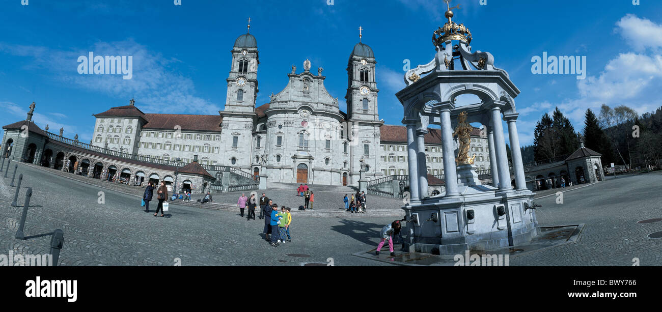 Canton Schwyz cloister Einsiedeln folks minster panorama passersby people place place of pilgrimage Switze Stock Photo