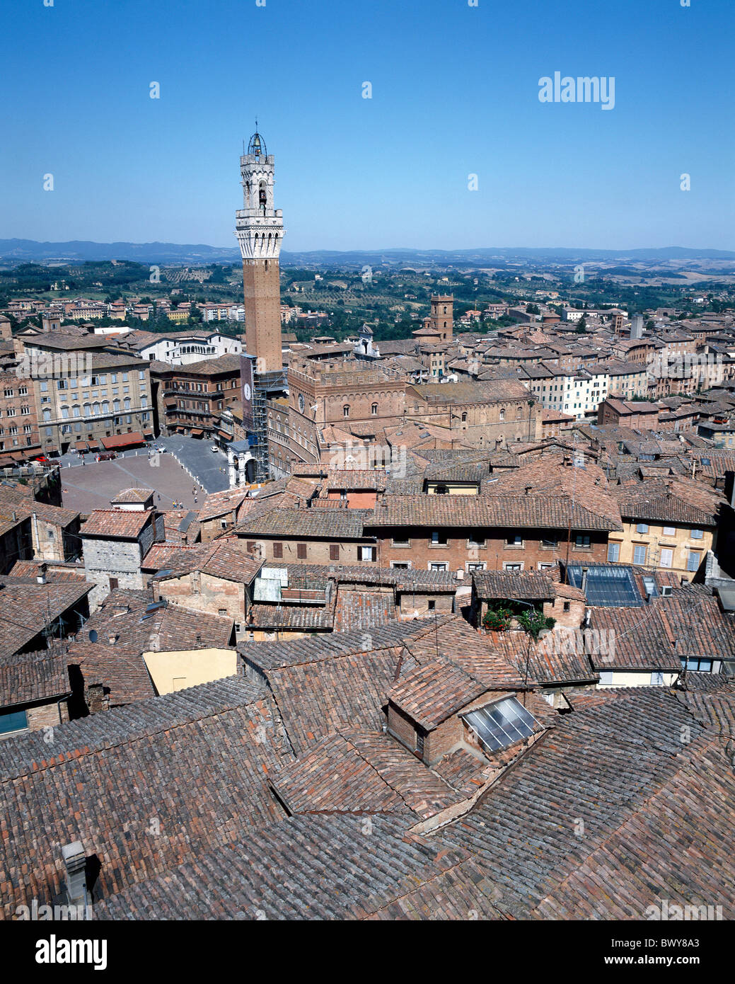 Campanile tower roofs Italy Europe Piazza del Campo Siena sienna overview Stock Photo