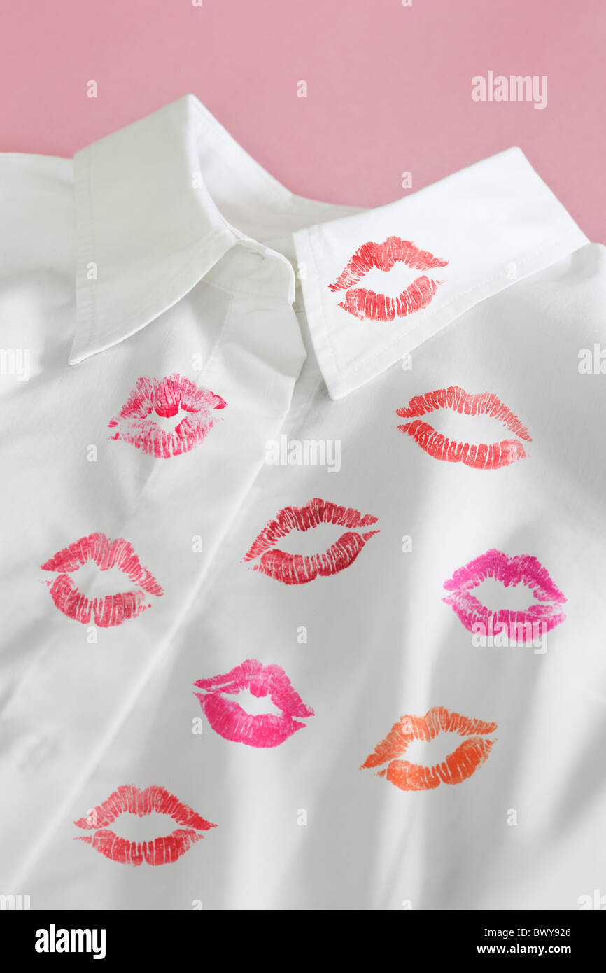 Lipstick Kisses on White Shirt Stock Photo