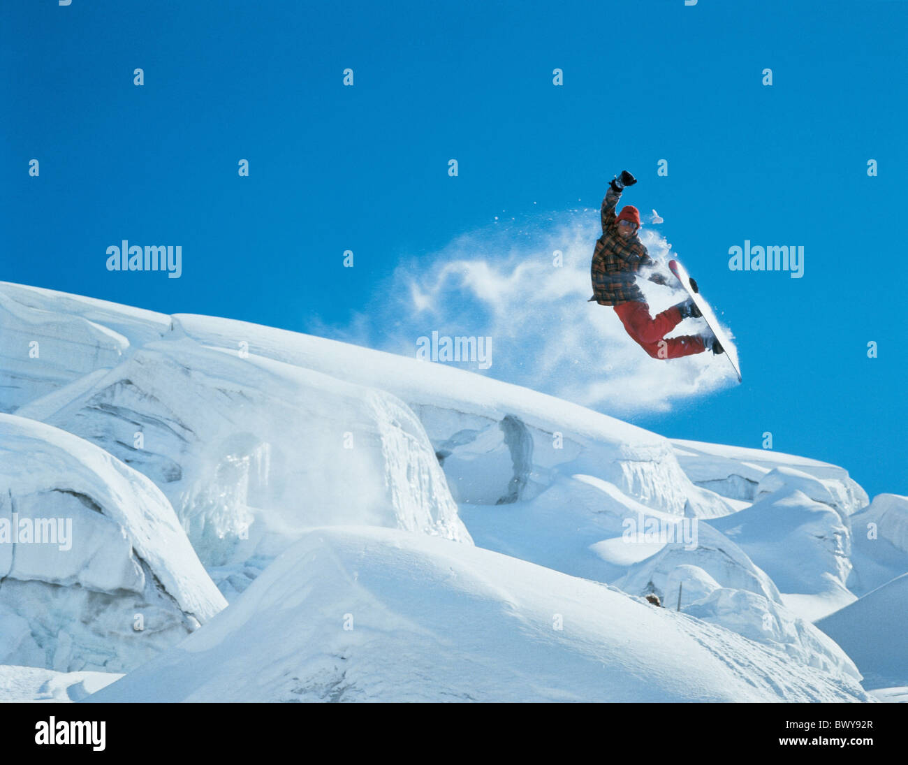 action inclination jump man slope snow snowboard Snowboarder spare time sports winter winter sports Swit Stock Photo