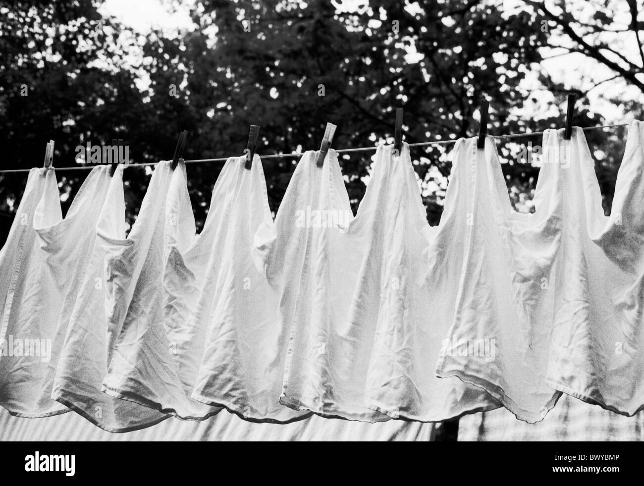 outside hang black and white napkins cloths scarfs laundry clothespins clothesline white Stock Photo
